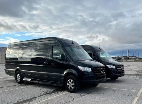 Black sprinter vans parking lot