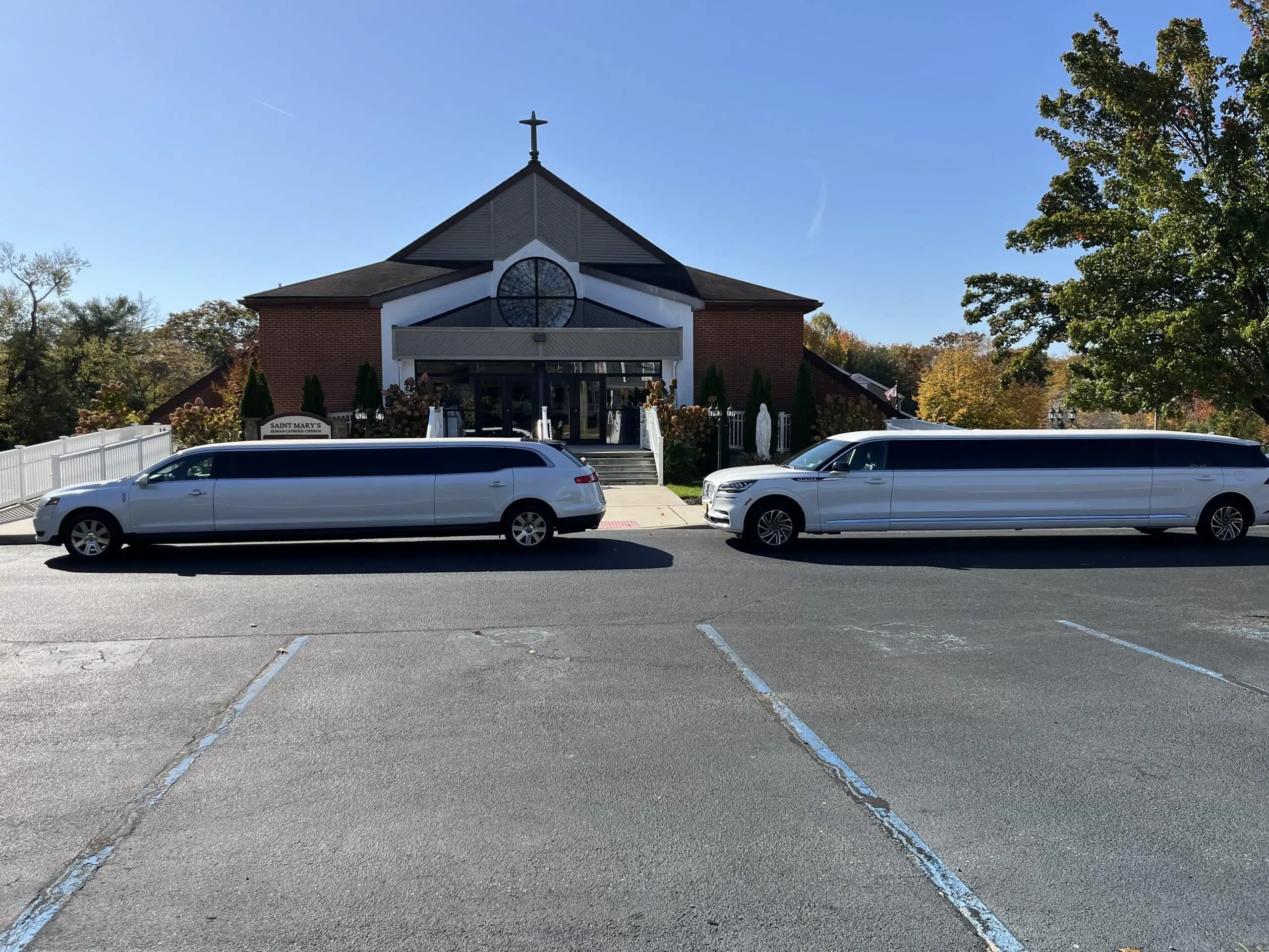 Limousines church autumn trees