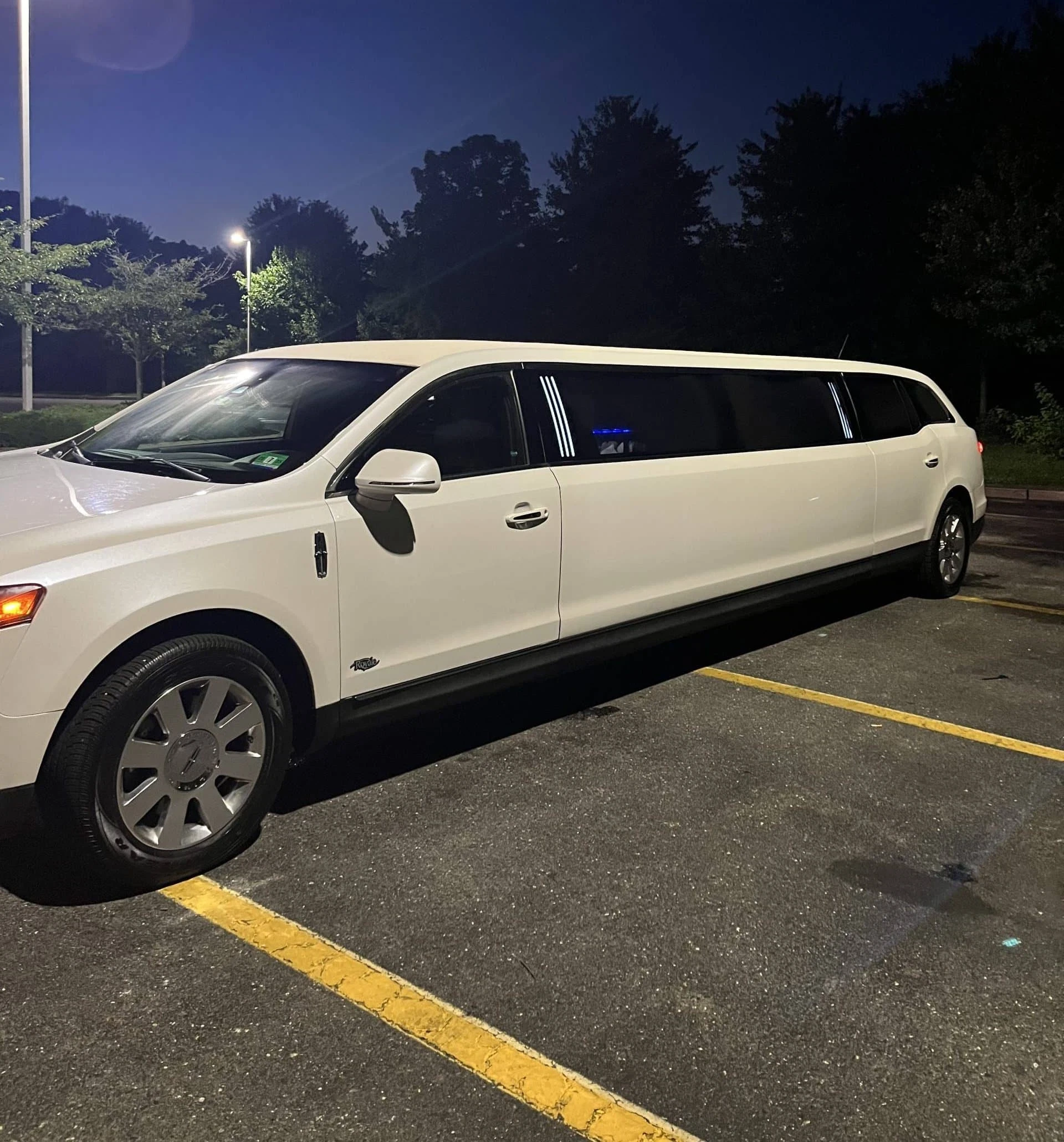 White Limousine Dusk Parking Duval County Florida in Duval, Florida