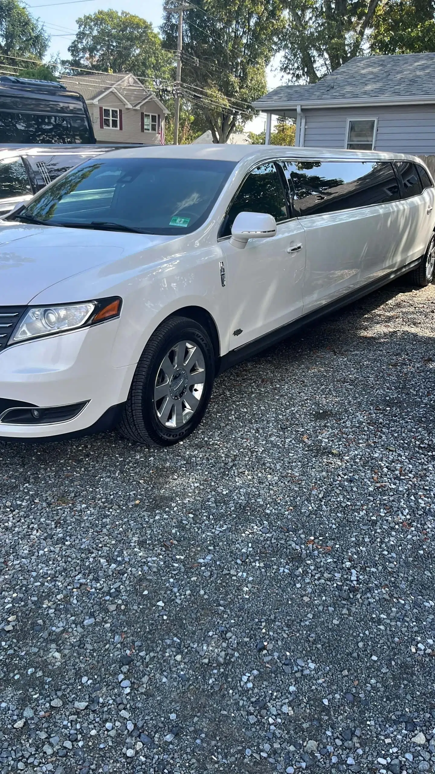 White limousine gravel driveway